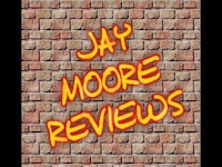 a brick wall with the words jay moore reviews