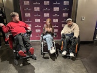 three people in wheelchairs sitting next to each other